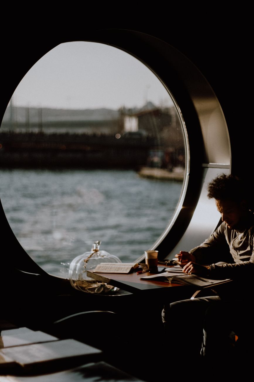 Travel author recording field notes